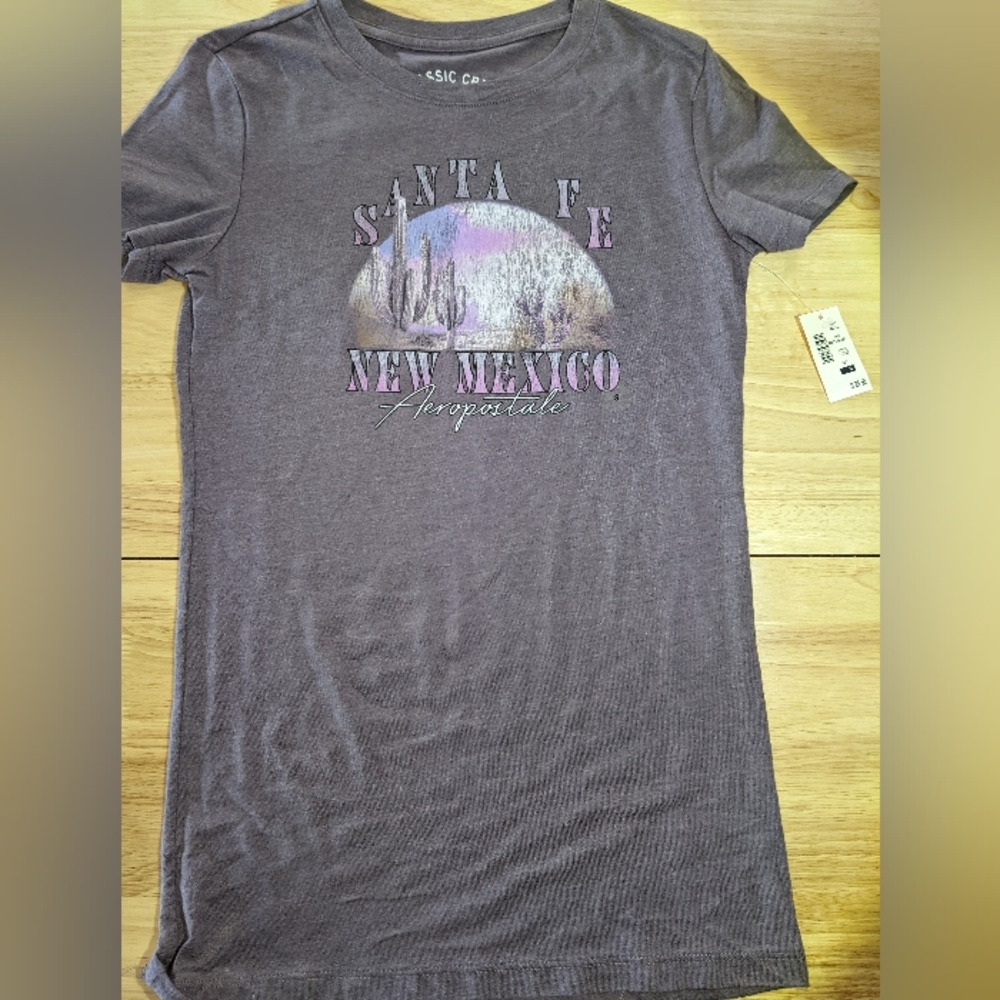 Woman size small aero t-shirt.